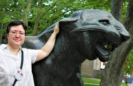 Julie Books at her 25th Princeton Reunion next to Tiger Statue